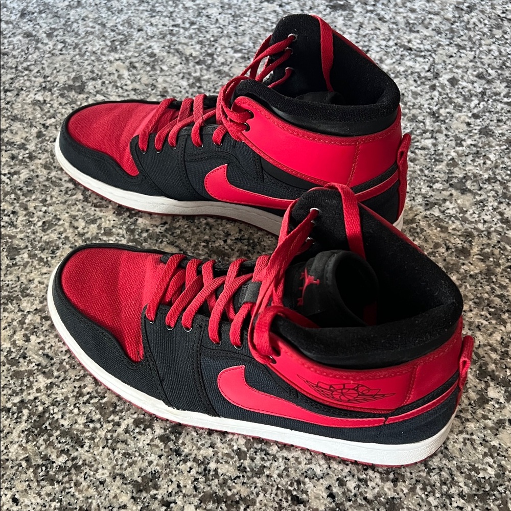 Air Jordan One KO (AJKO) Red and Black High OG Bred Sneakers.